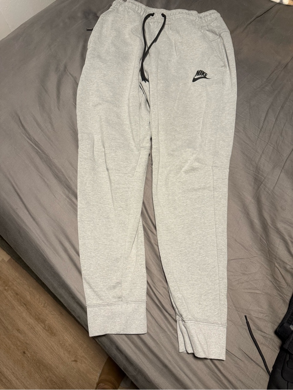 Nike Light Grey Fleece Jogger Pants with Black Logo